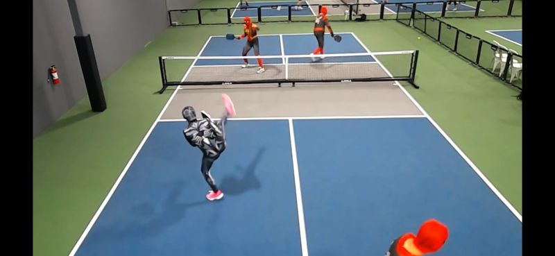 Our group playing pickleball in Spider-Man costumes